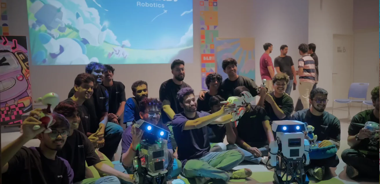 The Eyecandy team with their robots at the launch showcase.