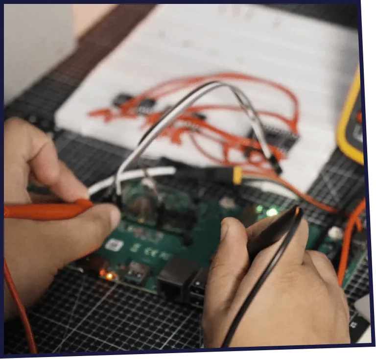 Testing robot electronics with probes.