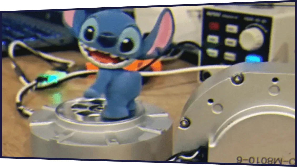 Character robots and mechanisms on a workbench.